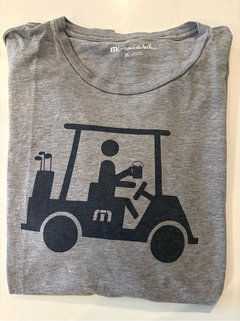 Travis Mathew Gray Tee with Navy Golf Cart Graphic